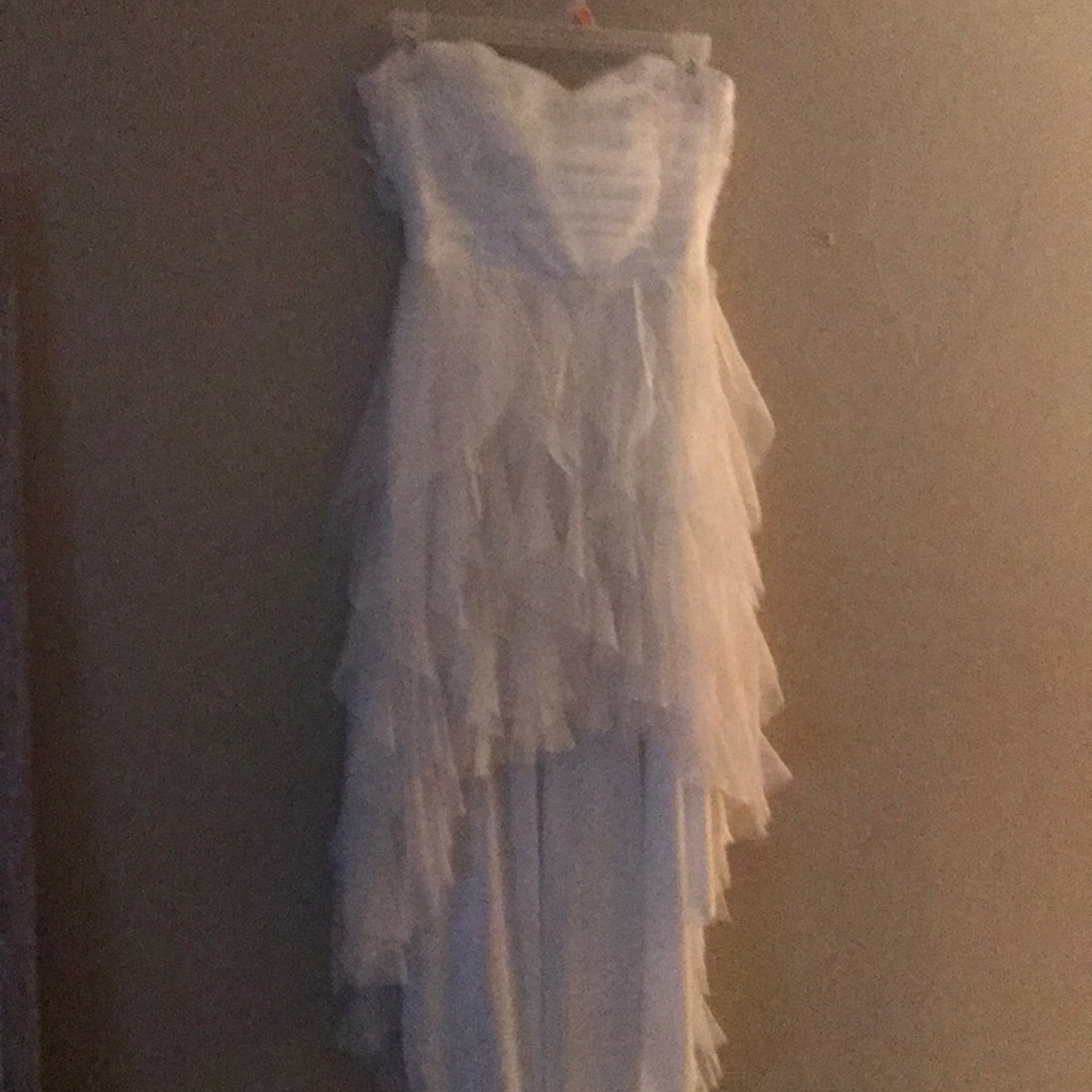 White gorgeous dress. High low. Sparkly. Poofy.